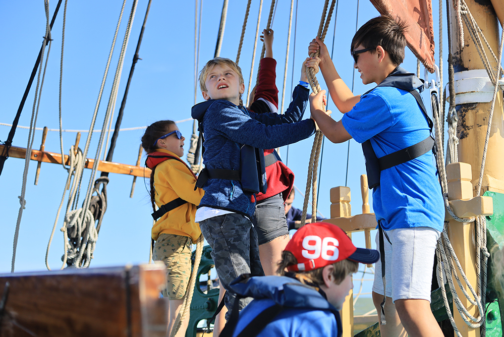 Brailing up the mainsail